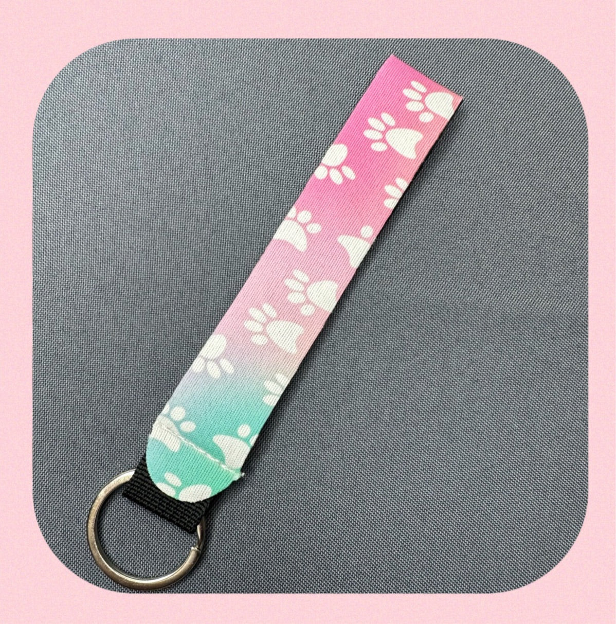 Pink & blue paw print wristlet keychain