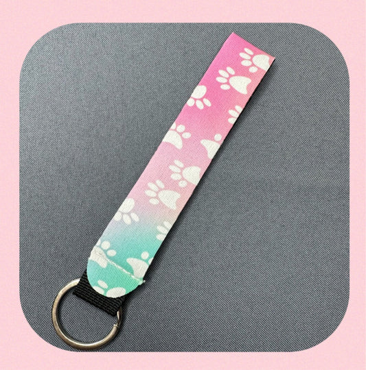 Pink & blue paw print wristlet keychain
